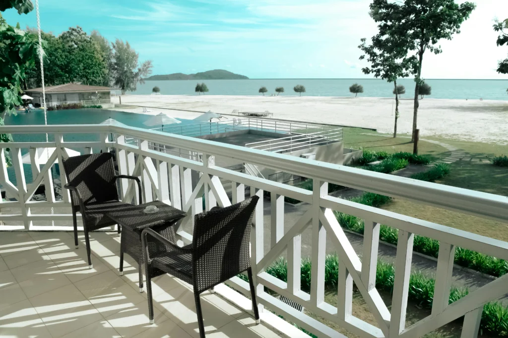 Beachfront balcony with white timber railing by Balcony Construction Christchurch