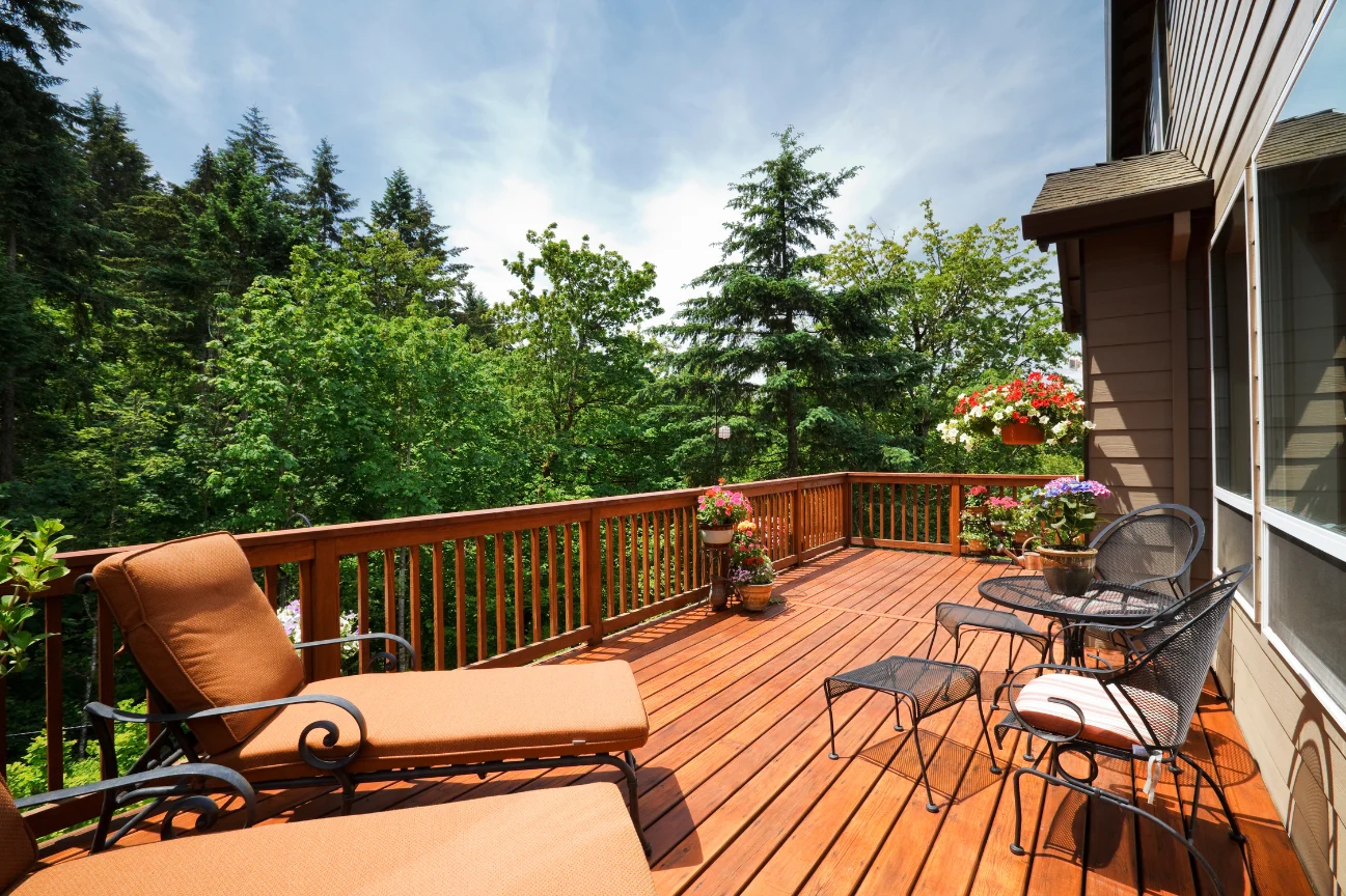 Scenic deck construction Canterbury design by Deck Builders Christchurch with lounge chairs and forest views