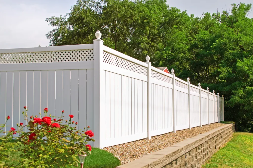White privacy fence installed by Fence Builders Christchurch with expert care from Deck Builders Christchurch.