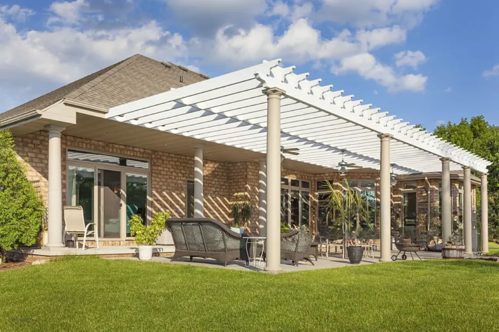 White pergola attached to house built by Pergolas Christchurch with quality service from Deck Builders Christchurch.