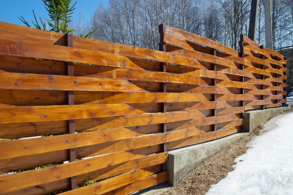 Modern wooden fence built by Fence Builders Christchurch with creative design from Deck Builders Christchurch.