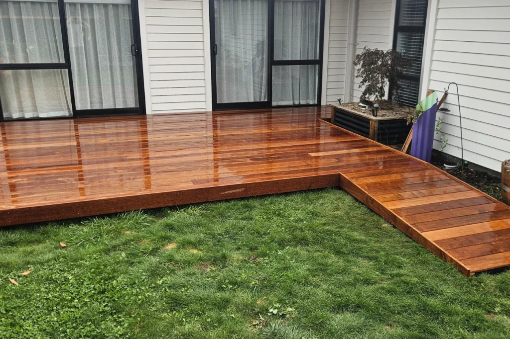 Timber deck with step access constructed by reliable deck builders christchurch.